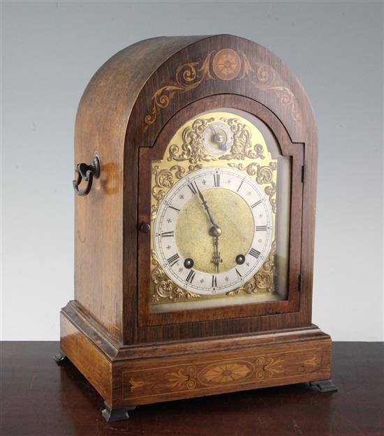 An Edwardian marquetry inlaid rosewood mantel clock, 14.5in.